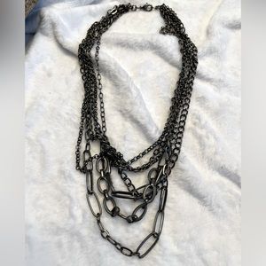 Very cute multi strand grayish / black metal. Purchased at Kohl’s
